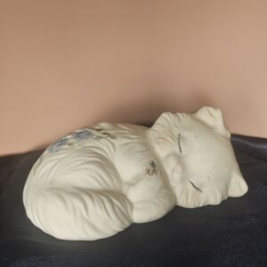 Vintage sleeping white cat with blue flower accents